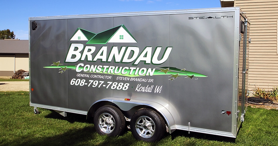 Cargo trailer lettering & graphics for Brandau Construction Kendall, Wisconsin.