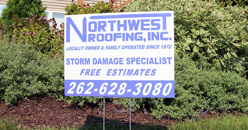 Staked yard sign for Northwest Roofing Richfield, Wisconsin.