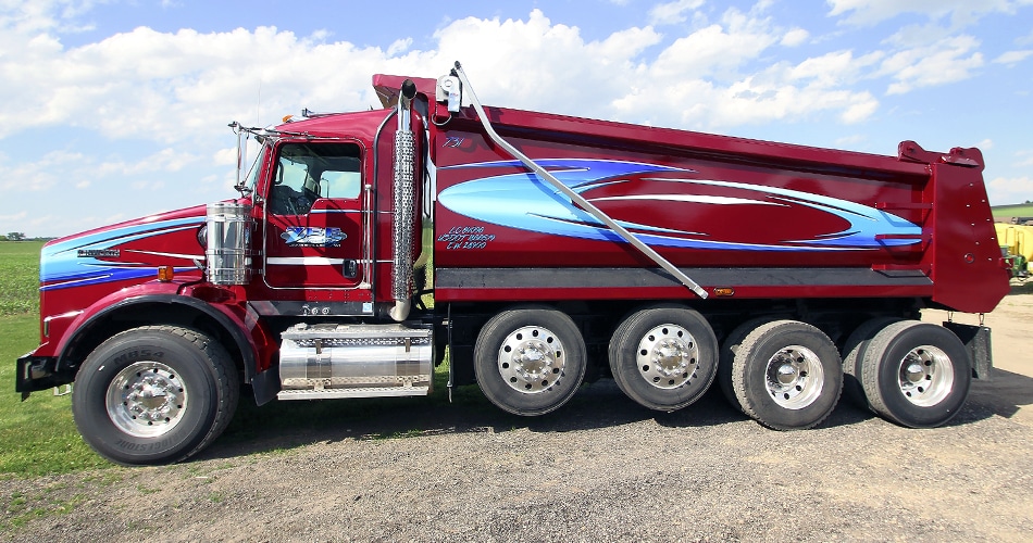 Kenworth dump truck lettering & graphics for Zee Trucking in Janesville, Wisconsin.