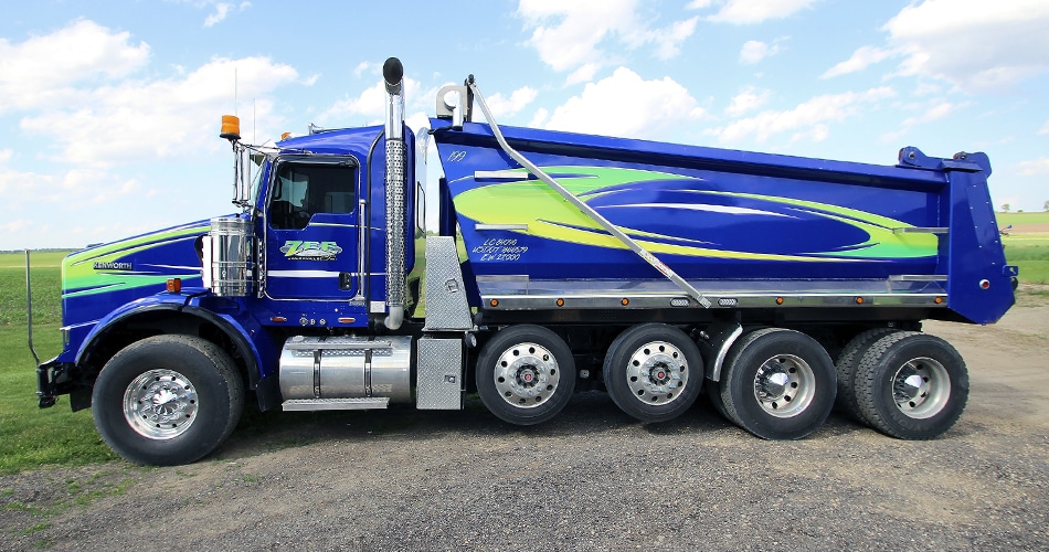 Kenworth dump truck lettering & graphics for Zee Trucking Janesville, Wisconsin.