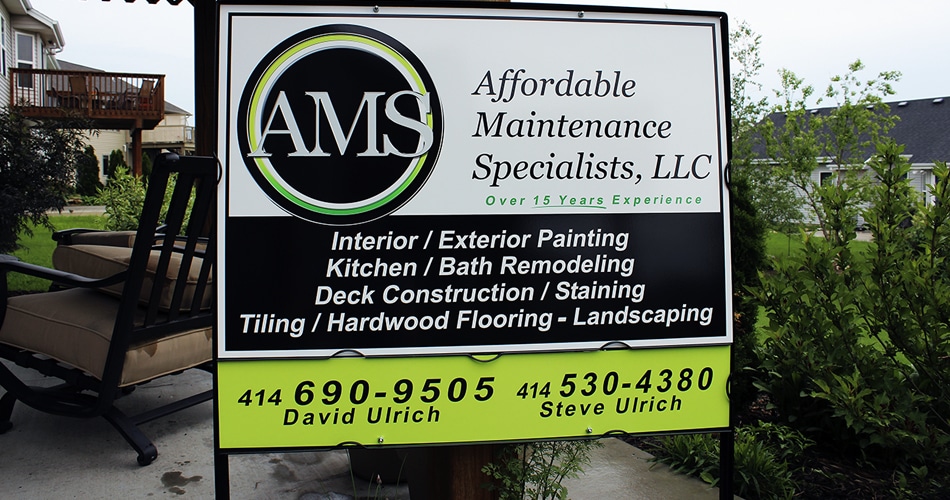 Commercial business sign for Affordable Maintenance Service Kewaskum, Wisconsin.