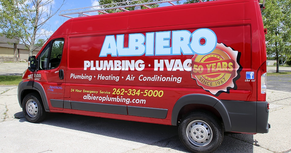 Fleet van lettering & graphics for Albiero Plumbing in West Bend, WI.