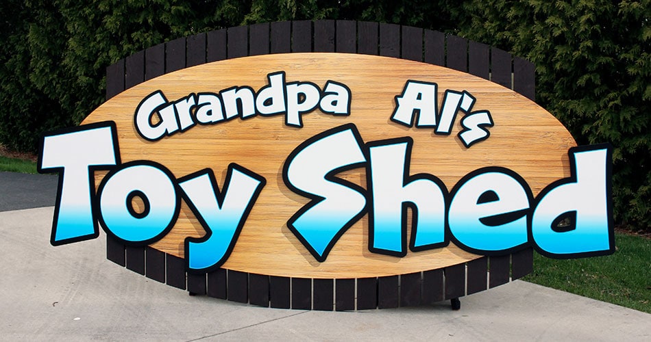 Toy Shed custom wood sign made by a local sign shop.