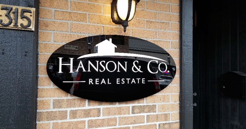 Business wall sign for Hanson & Co. West Bend WI.
