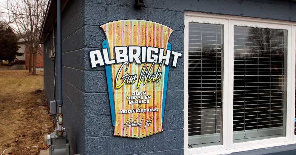 Custom exterior sign for Albright Gun Works in Hartland, WI.