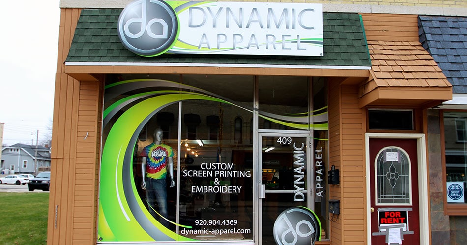 Outdoor business signs for Dynamic Apparel shop in Waupun, WI.