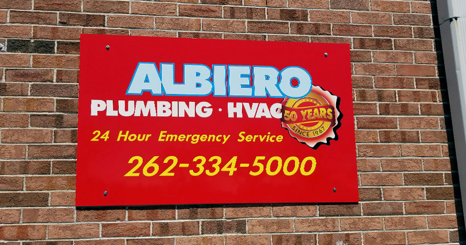 Outdoor wall signs for Albiero Plumbing in West Bend, WI.