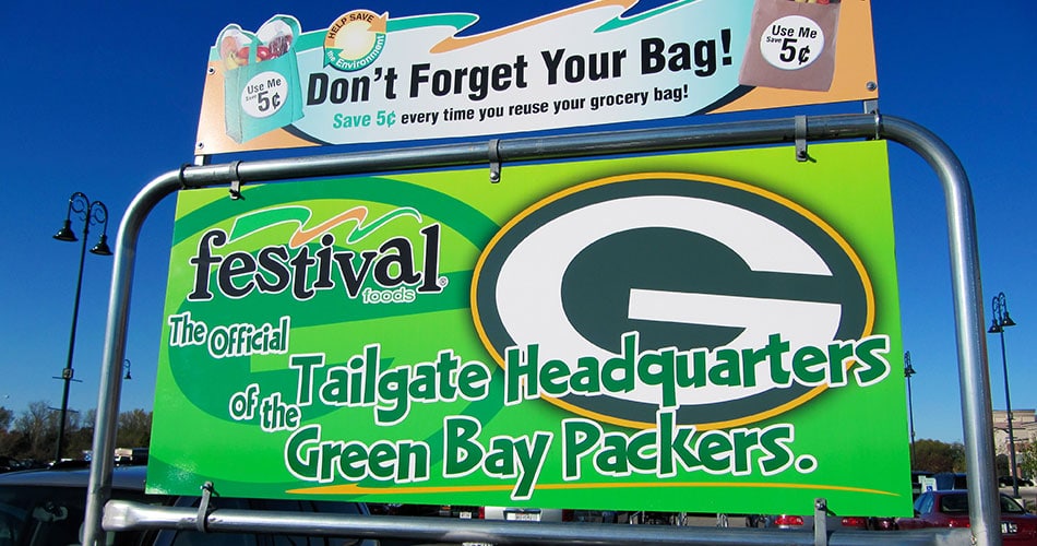 Parking lot store signs for Festival Foods.