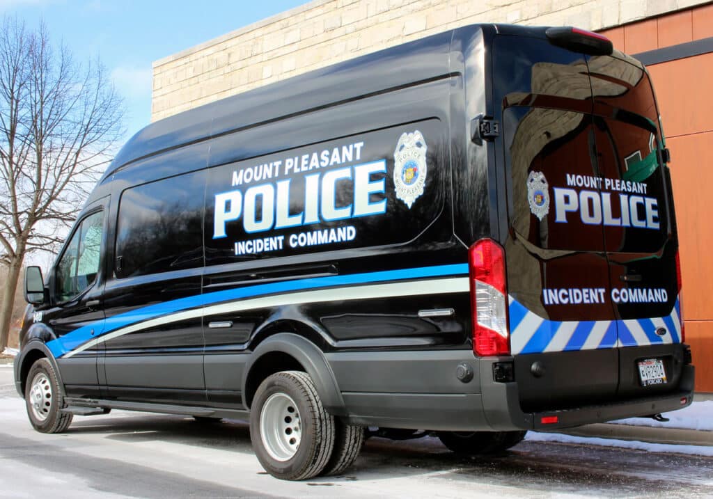 Mount Pleasant Police with van graphics.